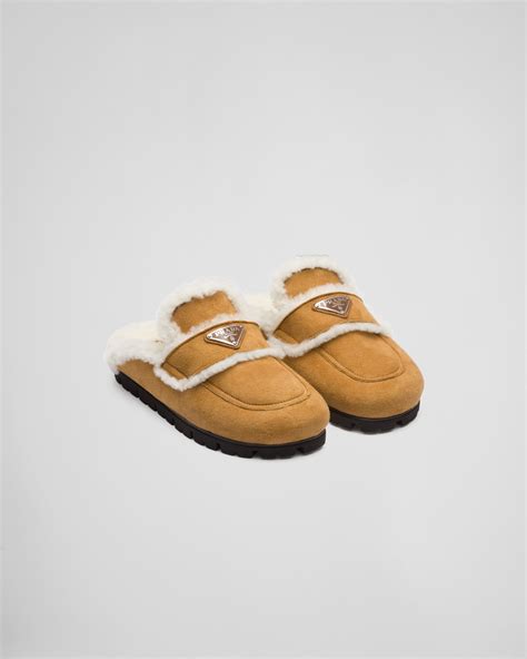 prada shearling slippers.